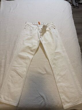 Earnest Sewn white denim jeans with copper rivet